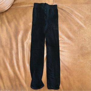 Black tights for a girl 5-8 y.o. (approximately)